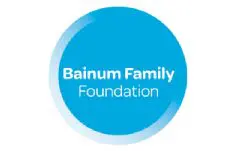 A blue circle with the words bainum family foundation in it.